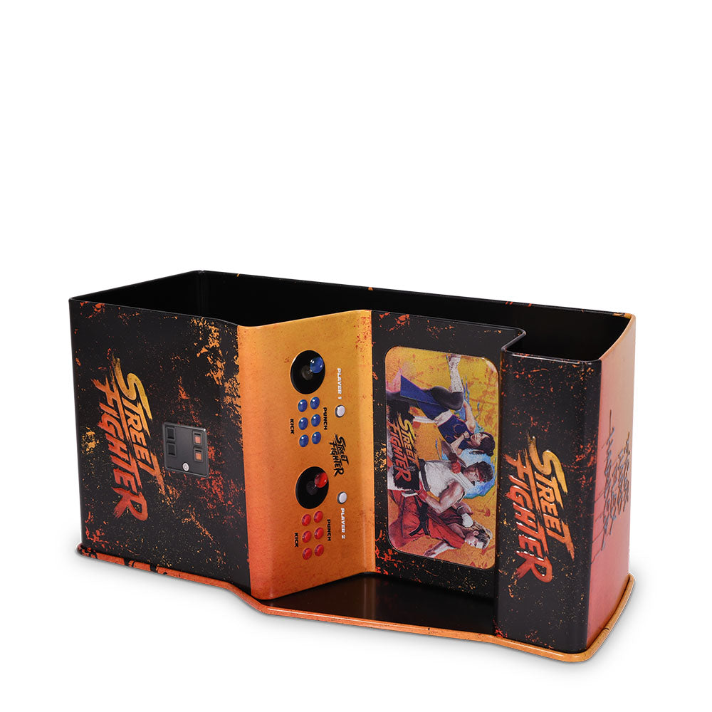Lifestyle angle of the Street Fighter popcorn bucket displayed next to home entertainment setup