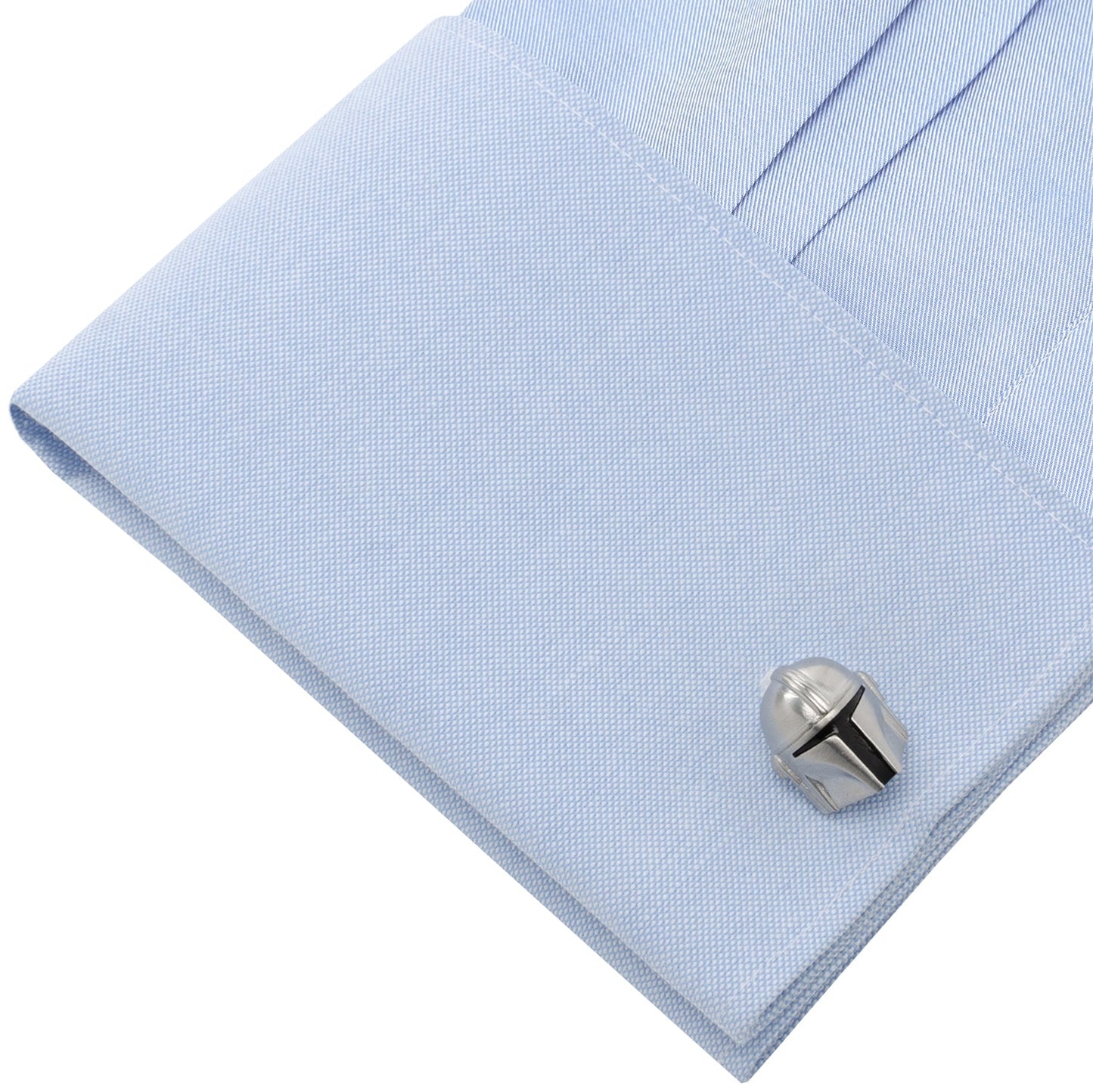 Reverse side of the Mandalorian cufflink swivel closure featuring the debossed mythosaur skull.