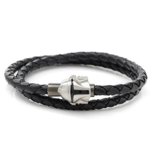 Close up of the 3D Mandalorian helmet magnetic closure on a black braided leather bracelet