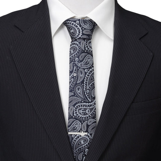 Close-up of hidden Grogu and helmet symbols in blue paisley tie pattern