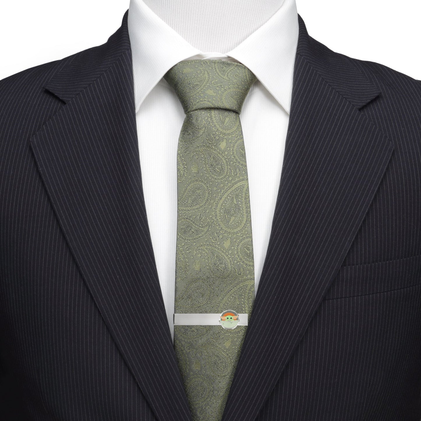 Close up of the Grogu in bassinet design on a silver-tone tie bar.