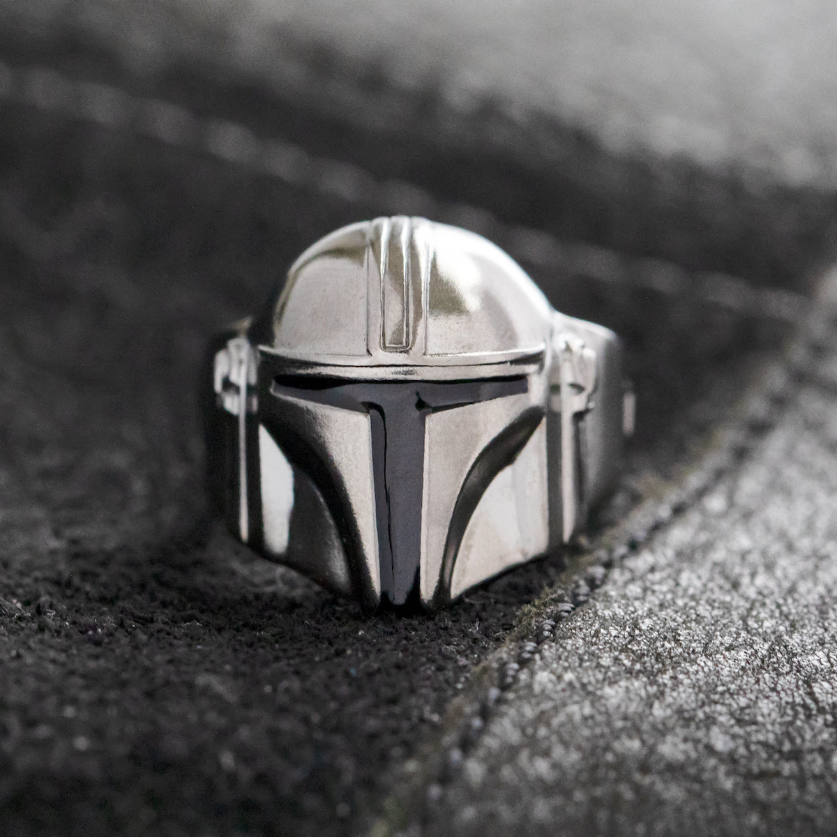 Angled view highlighting the polished finish and 3D depth of the jewelry.