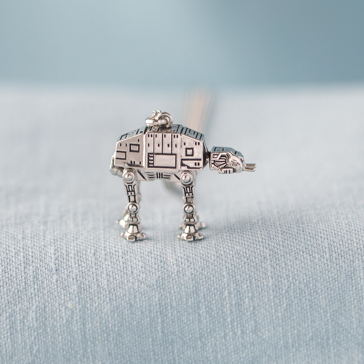 The AT-AT pendant shown on an adjustable sterling silver curb chain