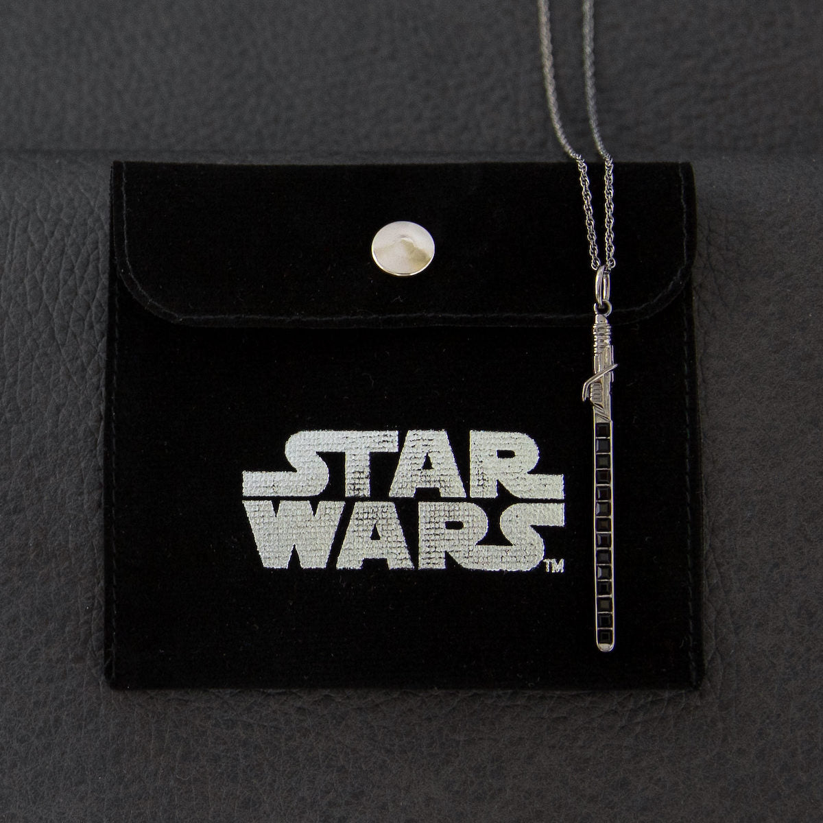RockLove Jewelry signature tag and extender weight on the sterling silver cable chain.