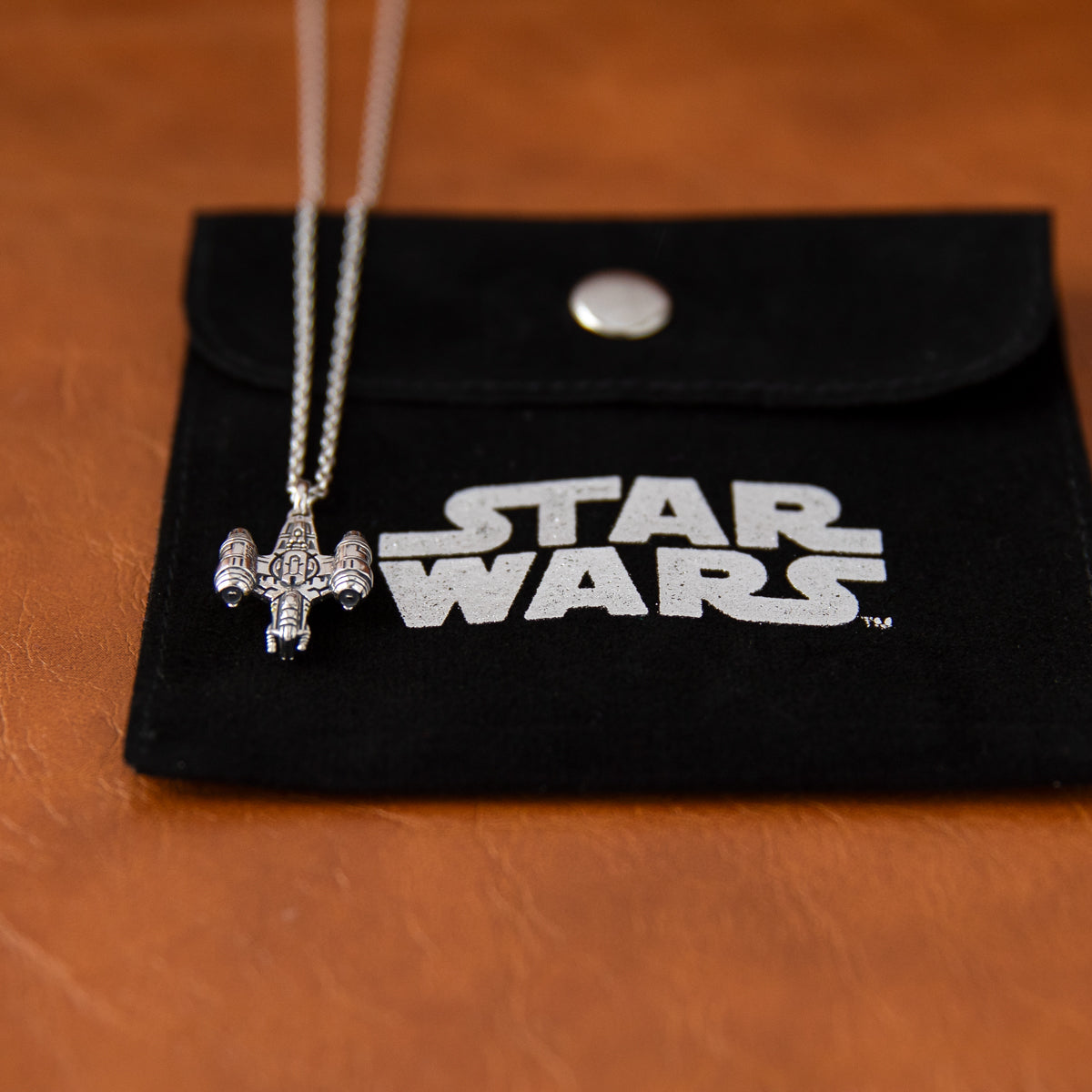 Mandalorian inspired Razor Crest jewelry for Star Wars fans