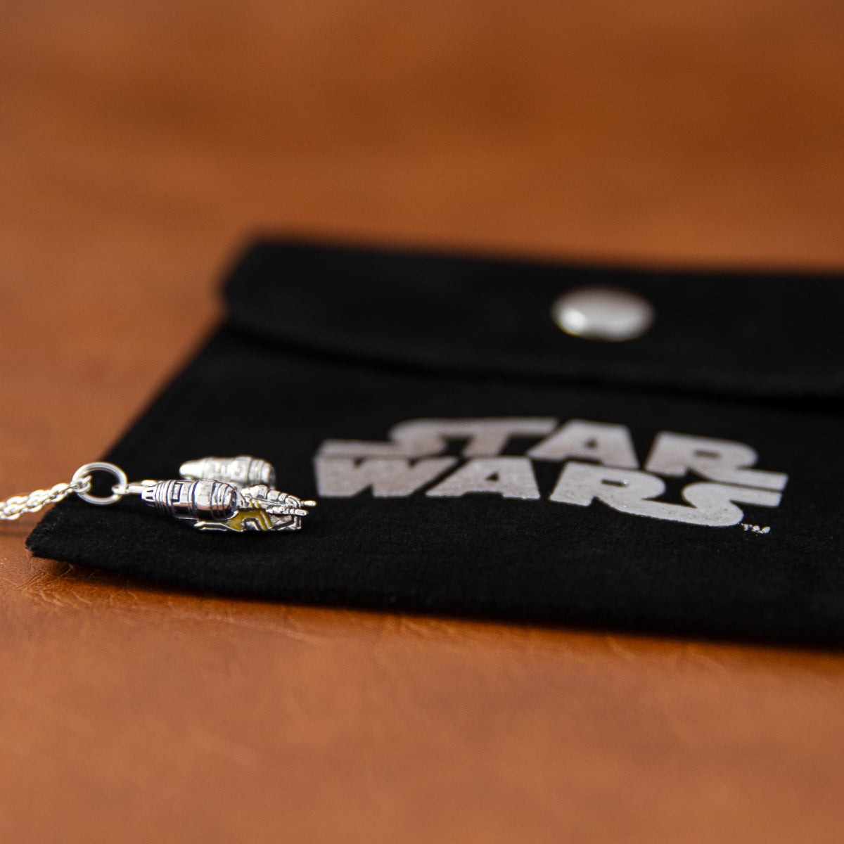Profile view of the 3D Star Wars Razor Crest pendant